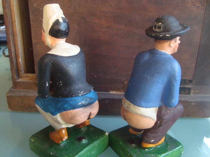 Father and mother suffering from diarrhoea, humorous toys with refills