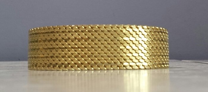 Wide 18 kt gold, gold plated bracelet