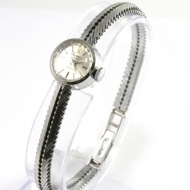Wristwatch from the 1950s/60s in 18 kt white gold, Swiss brand Rewel, 23.6 grams - bracelet measures 17 cm x .5 cm - watch diameter 1.8 cm