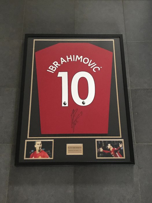 Zlatan Ibrahimovic signed framed Manchester United home 2017-2018 shirt with photo of the moment of signing and COA