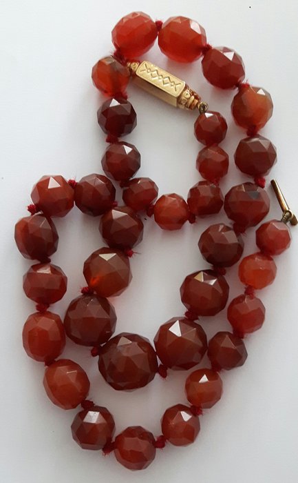 Antique necklace made of facet cut Carnelian and 14 kt gold clasp from circa 1900