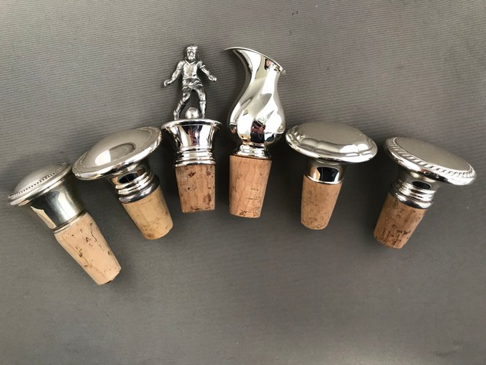 Six silver antique bottle stoppers