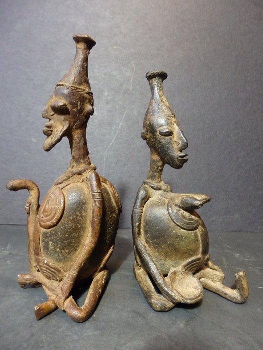 2 fertility statues in bronze and stone - DOGON - Mali - Catawiki