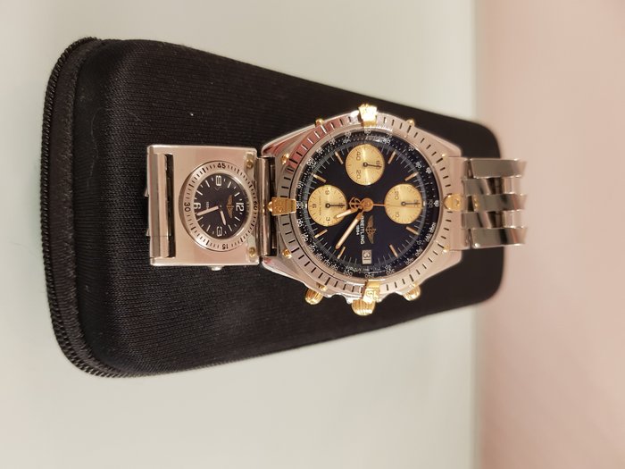 Breitling watch with dual time, model for men in perfect condition. Reference number: B13050 1 05471, 2000-2010 period, steel/gold