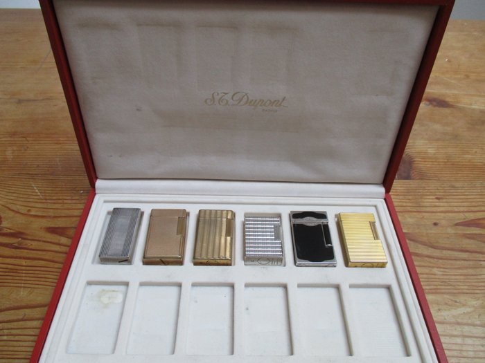 6 ST DUPONT lighters in a leather Dupont display box from the 40-80s