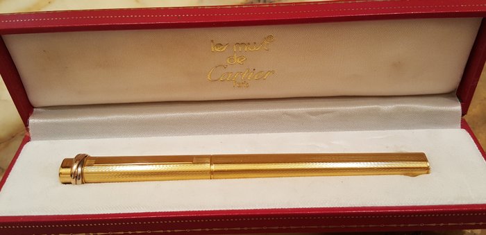 Must de Cartier 18 kt gold plated ballpoint pen.