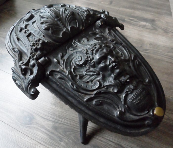 Cast iron cinder tray with image - possibly Zeus - Corneau Freres - Charleville - France - c. 1890