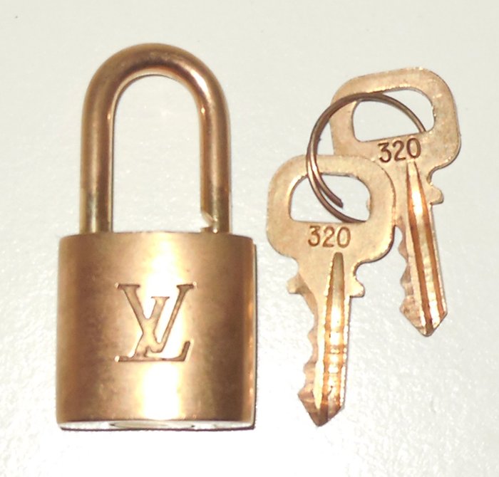 Louis Vuitton cadena/padlock/lock with 2 key - Catawiki