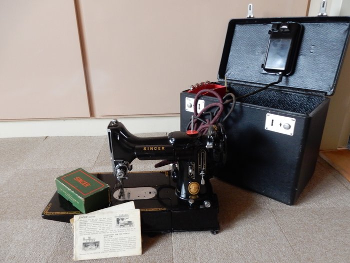 Antique Singer sewing machine model 222k, complete in original case