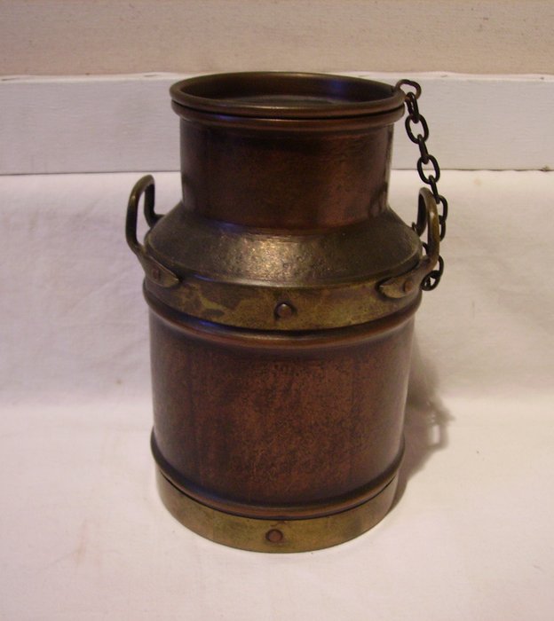Jean Paul Thevenot /milk pot in copper and brass / signed.