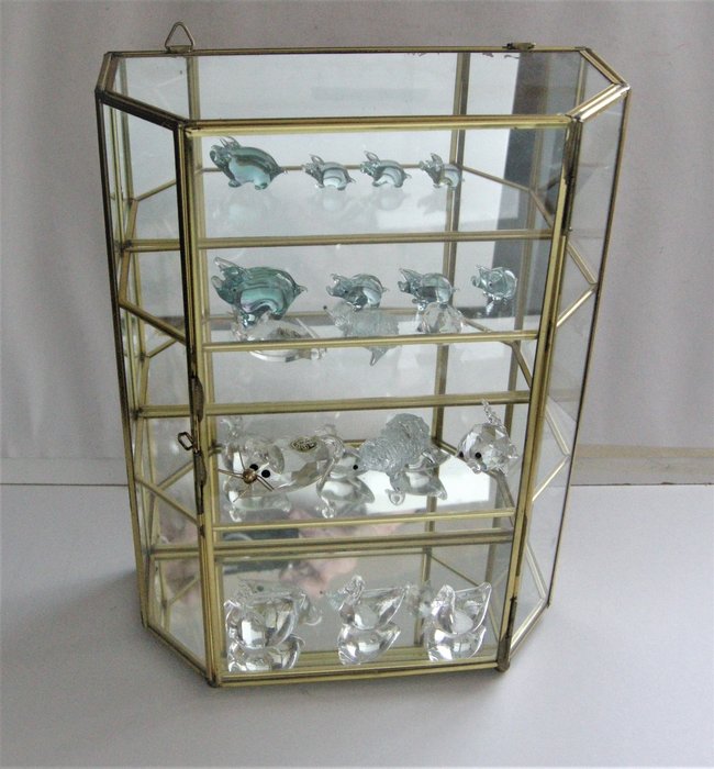 Small display case cabinet with glass miniature animal figures
