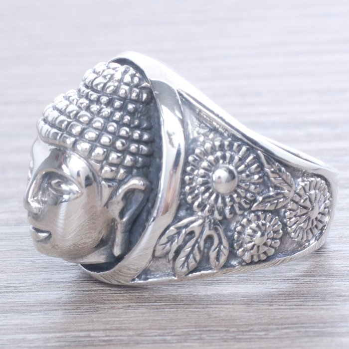 Sterling silver Buddha-shaped men's ring in Balinese design.