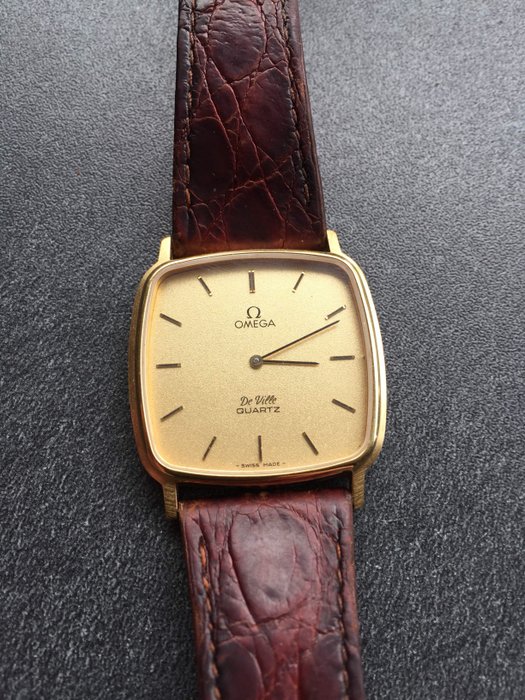 Omega De Ville quartz 1365 men's watch - 750 / 18 kt - with original crocodile leather strap by Omega and yellow gold dial - 1980s