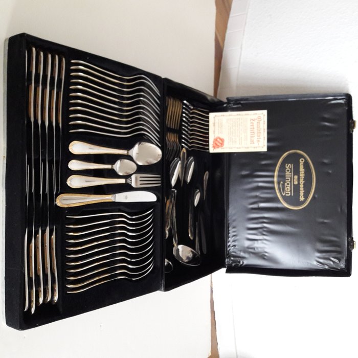 SBS Solingen - 70 piece luxury cutlery set for 12 people - 23/24 karat - hard gold plated - in black original case