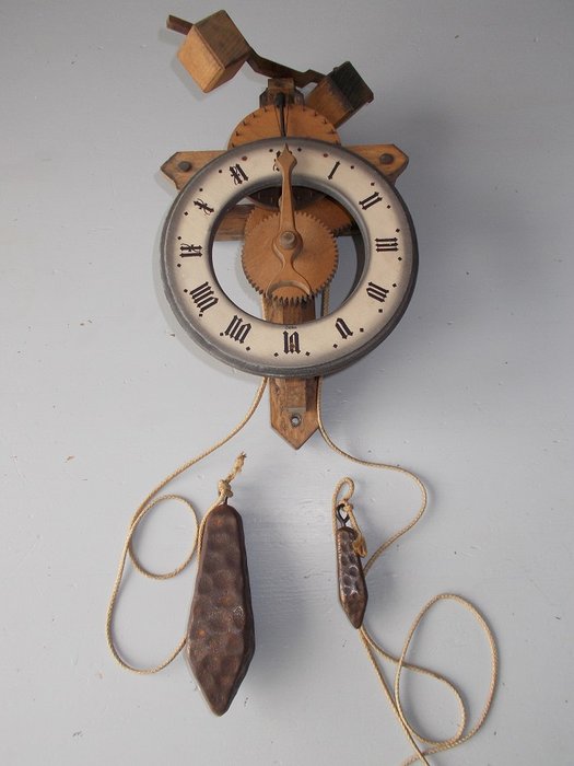 Wooden BUCO 1320 Pendulum Wall Clock by Baumann Ltd of Switzerland.