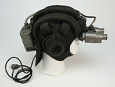 Infra-red night vision goggles with tank helmet and infra-red portable spotlight