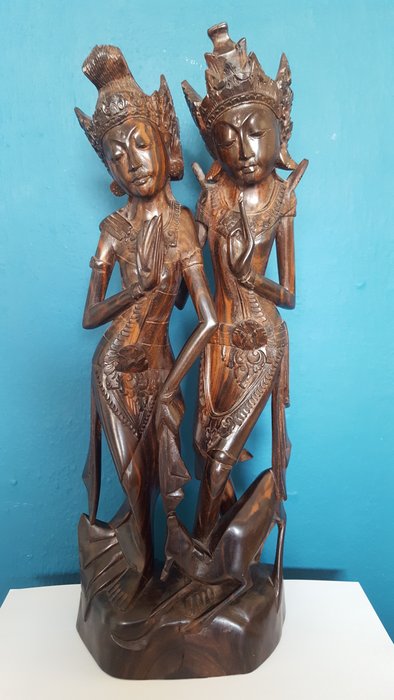 A statue of Rama and Sita carved from wood - Bali - Indonesia