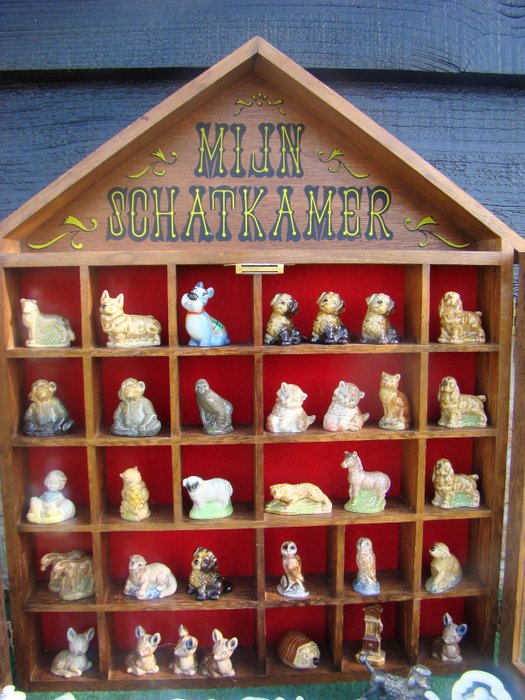 35 Wade figurines in display case and many other typecase figurines, ca. 1970, England