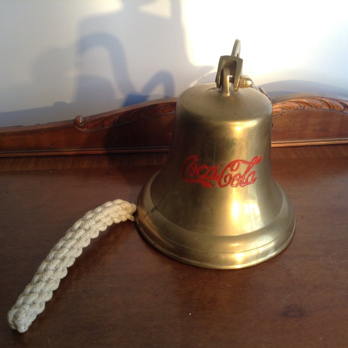 Collectible copper Coca-Cola bell.