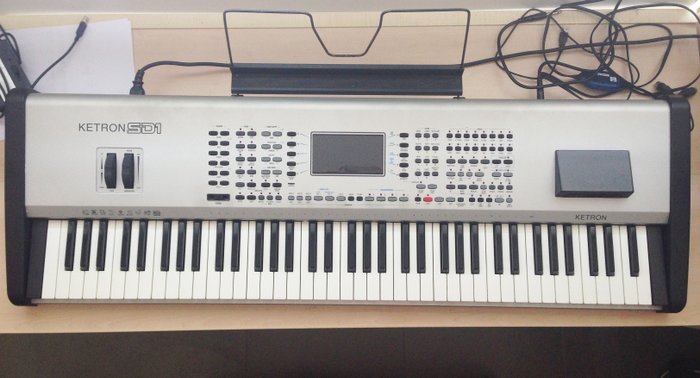 Ketron SD1 Plus keyboard - 76 keys Midifile player, lyrics, karaoke, transposition. Sampler, 16MB, 16 bit-44.1kHz. Vocal harmonizer, vocoder. 2 balanced micro inputs. 6-GB internal hard disk
