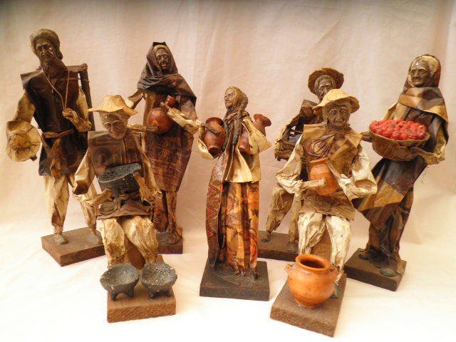 Seven papier-mâché dolls by folk artist from Mexico, period 1960.