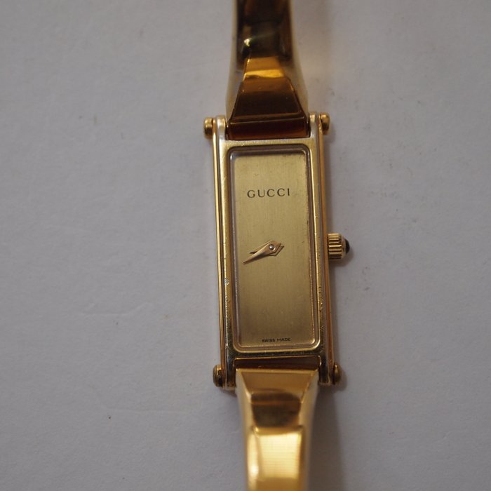 gucci 1500l watch gold price