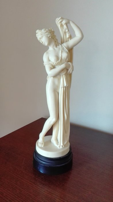 Vintage statue of a half-naked woman, signed L. Toni