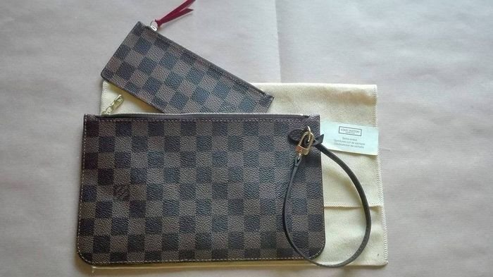 Louis Vuitton – Clutch bag with wrist strap / Coin purse - Catawiki