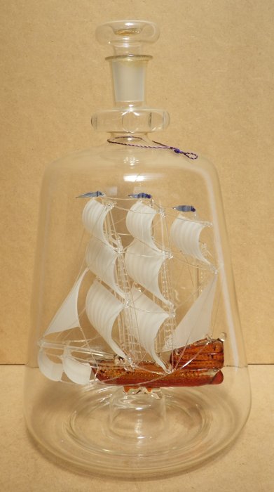 Glass ship in a bottle by Lymington Glass Mystics Ltd