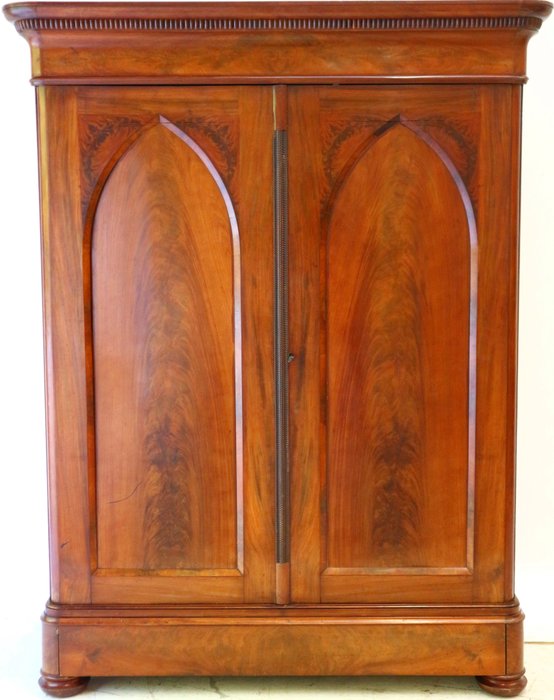 A Late Biedermeier Mahogany Linen Cabinet With Gothic Arches The