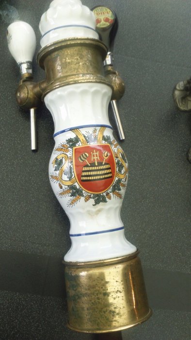 Antique beer tap, the middle part is a kind of porcelain.