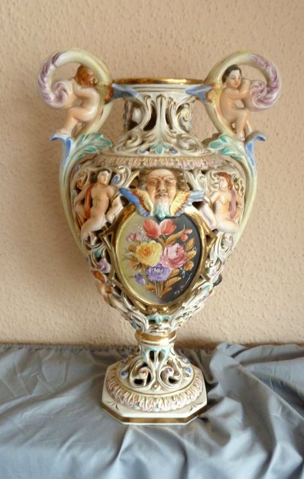 HC Capodimonte porcelain amphora vase, ornamental vase with cherubs, flowers, relief decor Italy