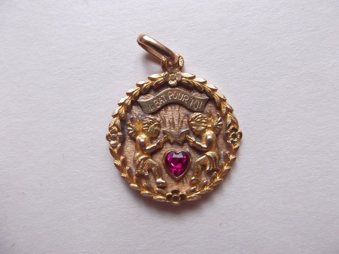 Rare Augis love medal, gold and ruby