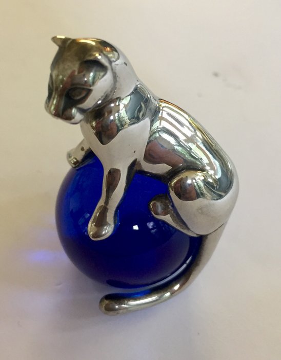 Cartier - paperweight: panther on blue glass sphere