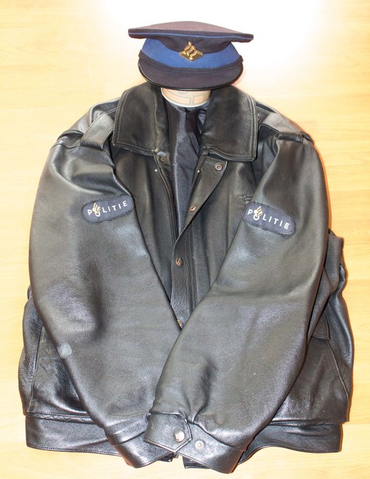 Old heavy leather police jacket and hat - The Netherlands - late 20th century