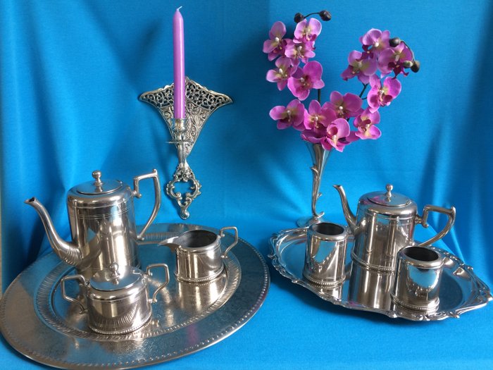 10 piece coffee and tea set from Tiel C.K. Holland 1715, silvered bronze wall sconce and vase.