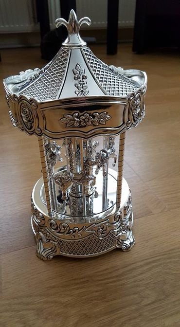 Gorgeous vintage silver plated Wallace carousel music box of Wallace Silversmith's.
