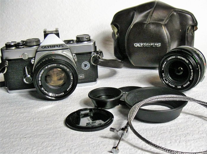 Beautiful Olympus om-1 analog SLR, with 2 lenses and accessories