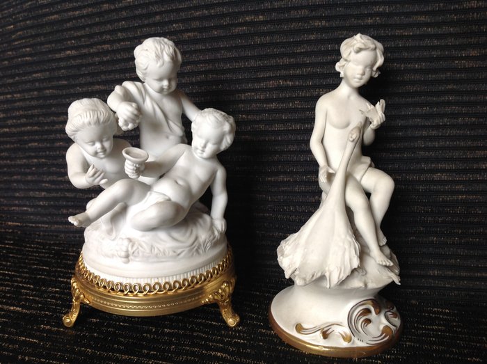 Unter Weiss Bach & Capodimonte - Two sculptures made of biscuit porcelain