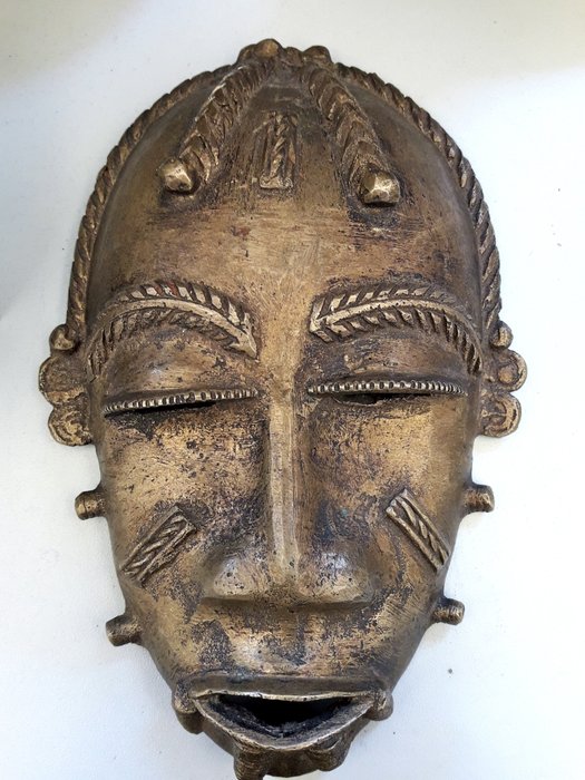 Bronze mask of a girl - HIMBA tribe - Northern NAMIBIA (Southern Africa), region of Kaokoland