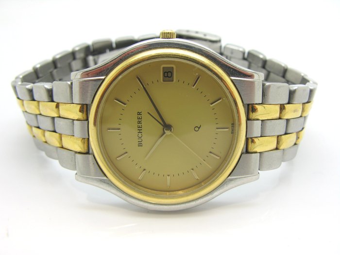 BUCHERER watch ref. 955.702 - 18 kt gold and steel case and bracelet - 1990s - in very good condition