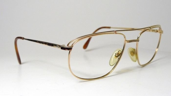 lacoste gold frame glasses