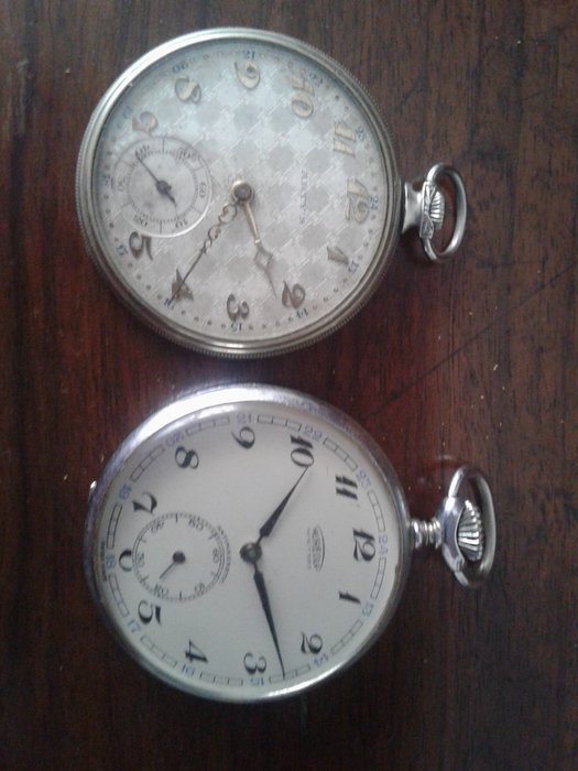 Two pocket watches (Aureole remontoir ancre de precision 15 rubis swiss) (Arty's metal extra blanc) 1900/1950
