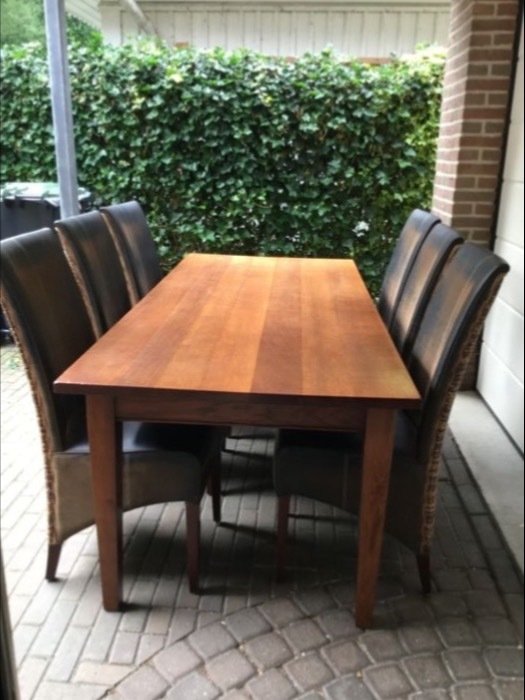 Oak wood dining table with 6 Lloyd Loom style chairs (2012 Cabana Loom) and a matching coffee table, the  Netherlands, circa 2000
