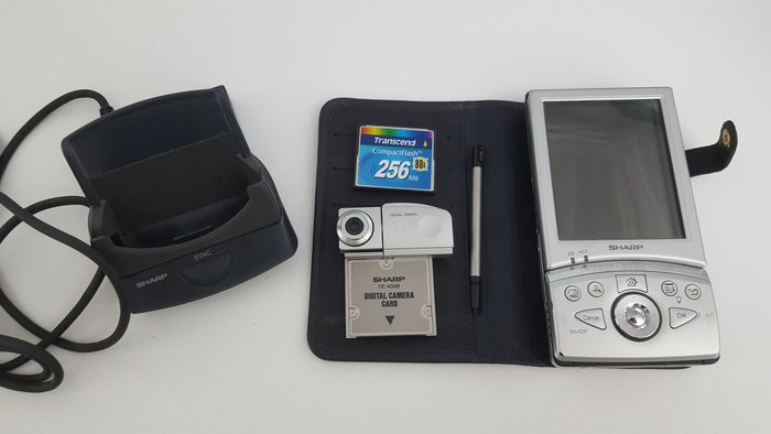 Sharp Zaurus SL-5500 PDA - with CF Camera CE-AG06 expansion, CF Card 256MB, stylus, case and dock