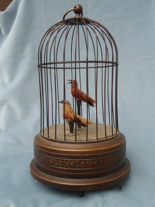 Bird cage with music box and two singing birds
