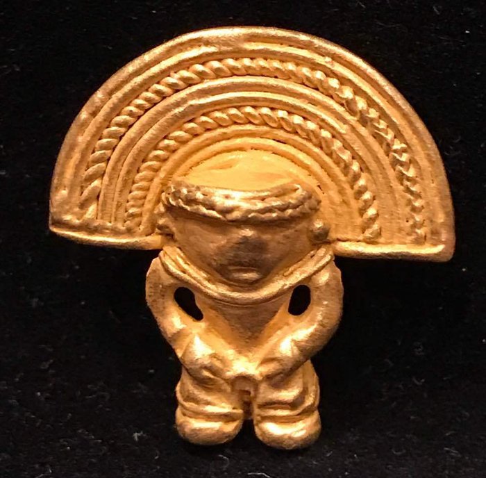 Tumbaga Gold , Colombia ,  Tairona Culture  - 24 x 22 x 4 mm ,  3,4 grams, A pendant of a Grand Shaman