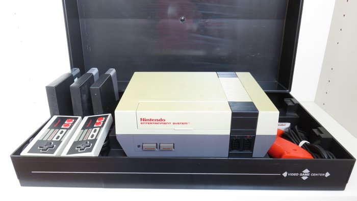 Nintendo NES with unique Video Game Organizer, 2 controllers, zapper & games