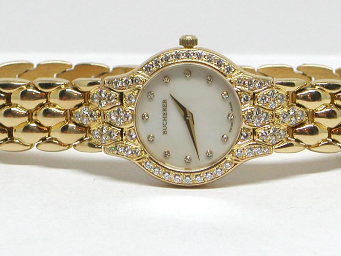 Bucherer - ladies 18k gold & diamond wristwatch