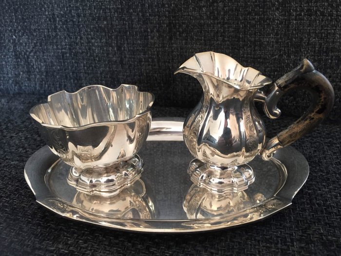 Silver cream set, 3 pieces, D.Aubert, The Hague, 20 century.